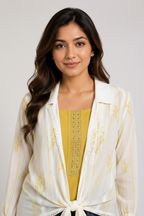 Close-up - white embroidered shrug