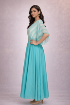 Side angle highlighting cape sleeves