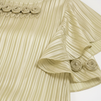 Texture shot - champagne gold pleated metallic fabric