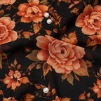 Texture shot - orange rose on black chiffon fabric